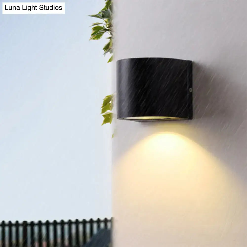 Minimalist black aluminum outdoor cylinder wall light outdoor space