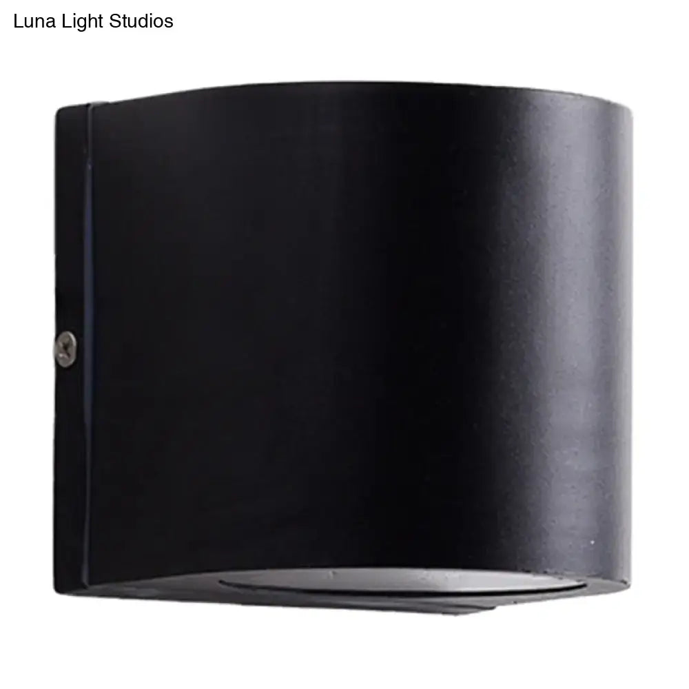 Minimalist black aluminum outdoor cylinder wall light outdoor space