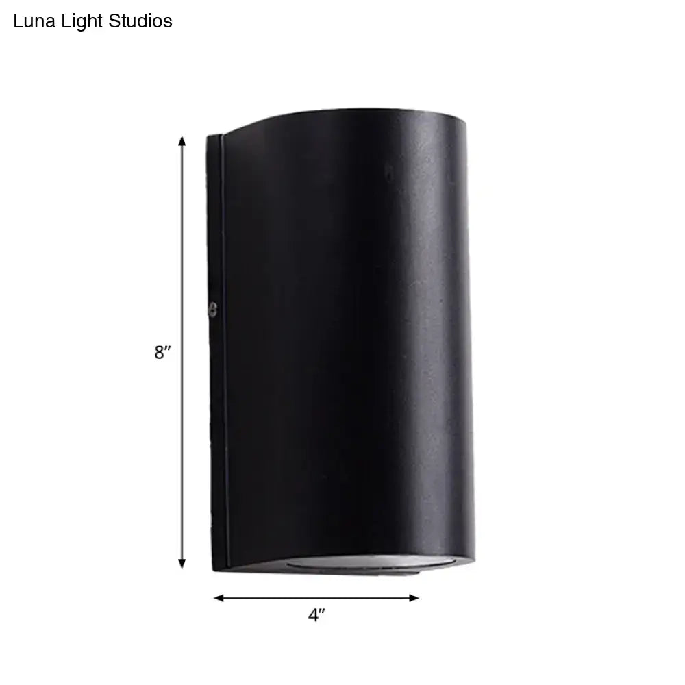 Minimalist black aluminum outdoor cylinder wall light outdoor space