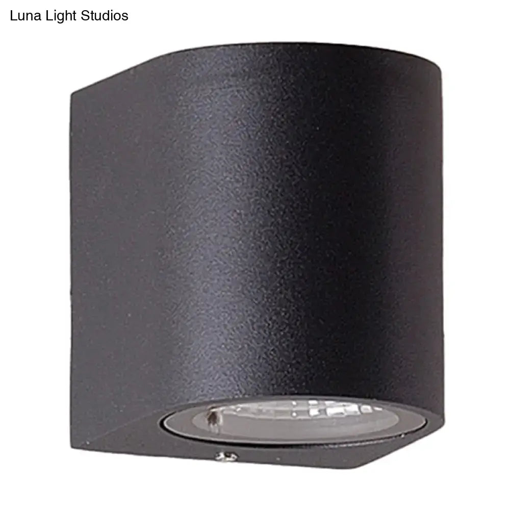 Minimalist black aluminum outdoor cylinder wall light outdoor space