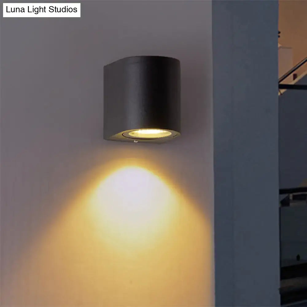 Minimalist black aluminum outdoor cylinder wall light outdoor space