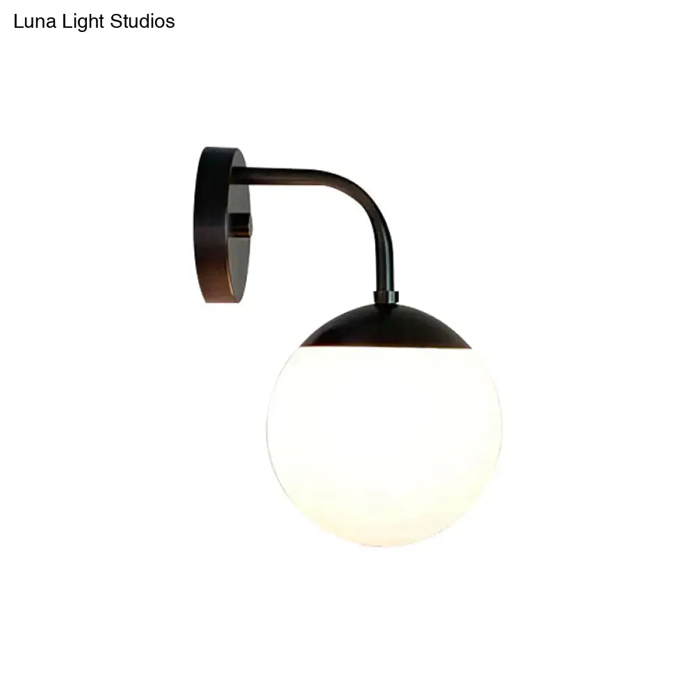 Minimalist black & gold wall light with milky glass ball for bedroom