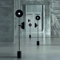 Black circular DecorBites™ Marble LED floor light with funnel shade and matte finish for modern living rooms 220v-240v