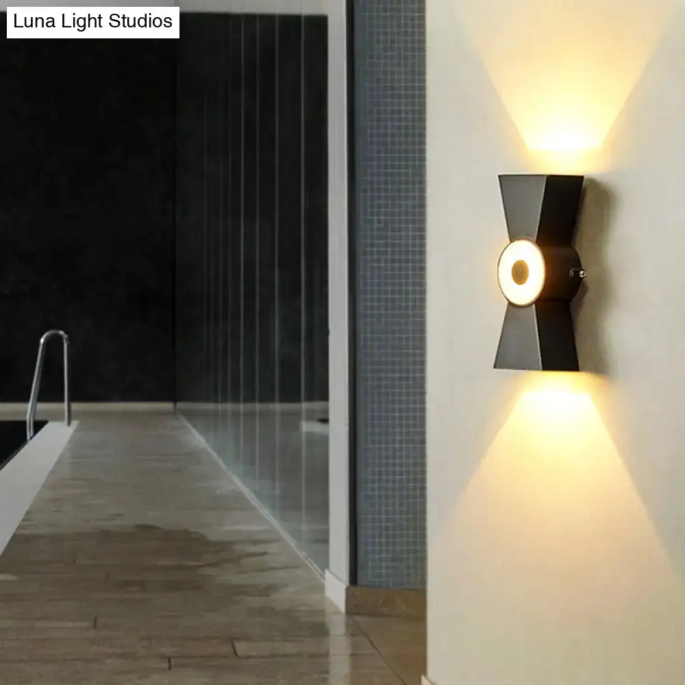 Minimalist black metal wall sconce warm white light bedroom fixture