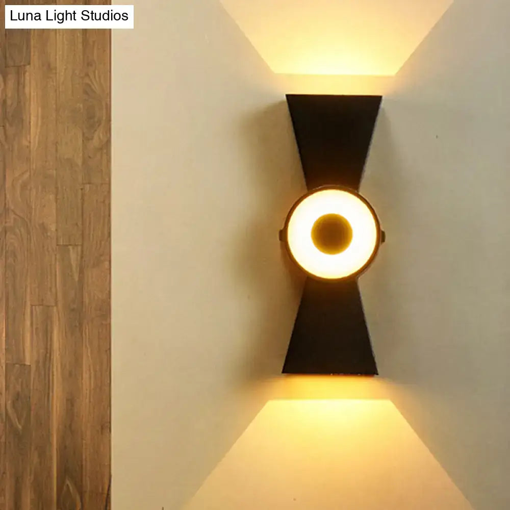 Minimalist black metal wall sconce warm white light bedroom fixture