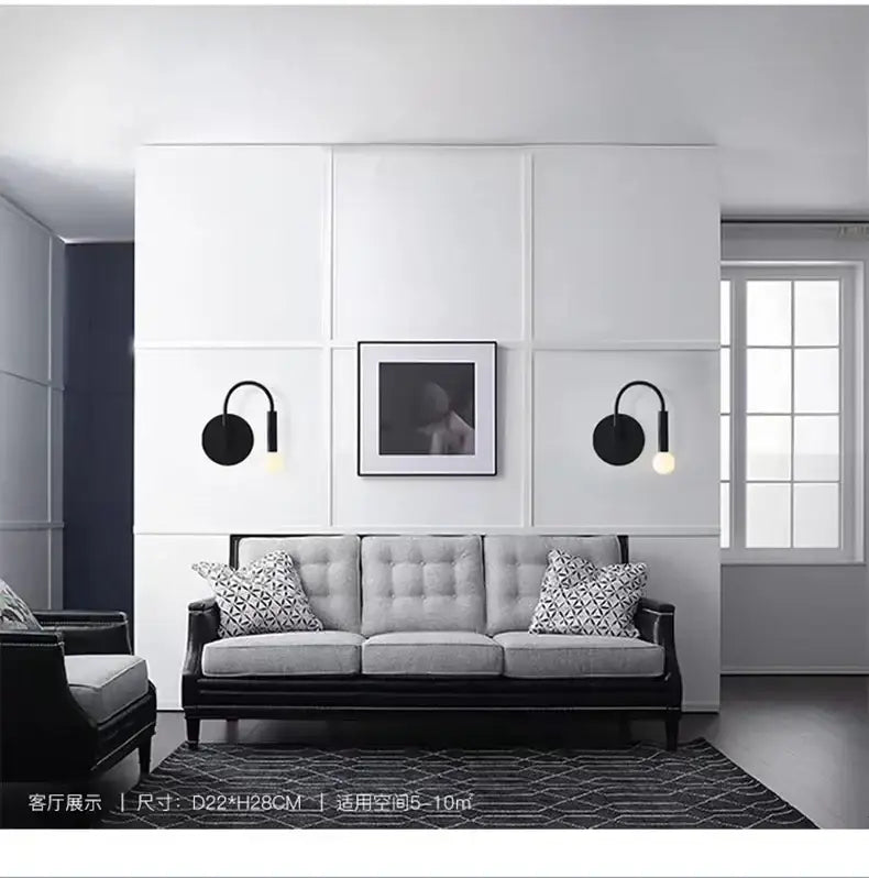 Minimalist black modern wall lamp bedroom curved sconce
