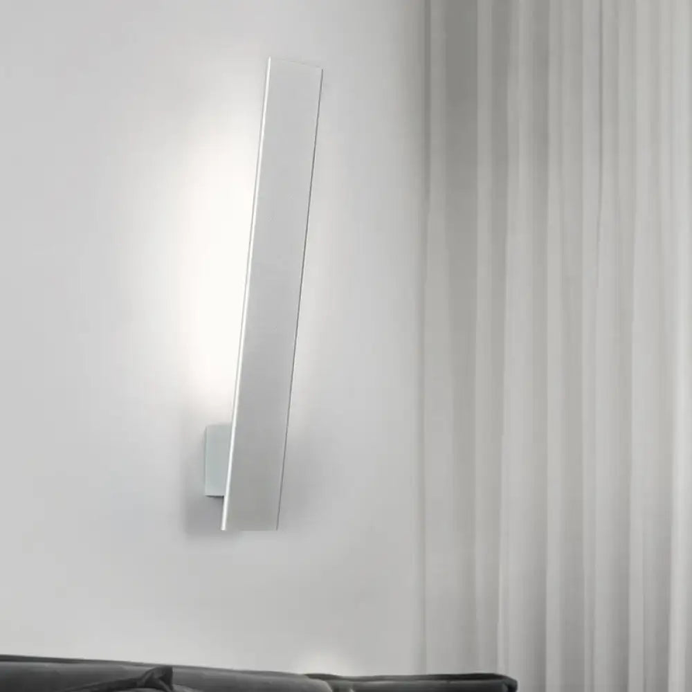 Minimalist black & white aluminum shade direct wired sconce bedroom