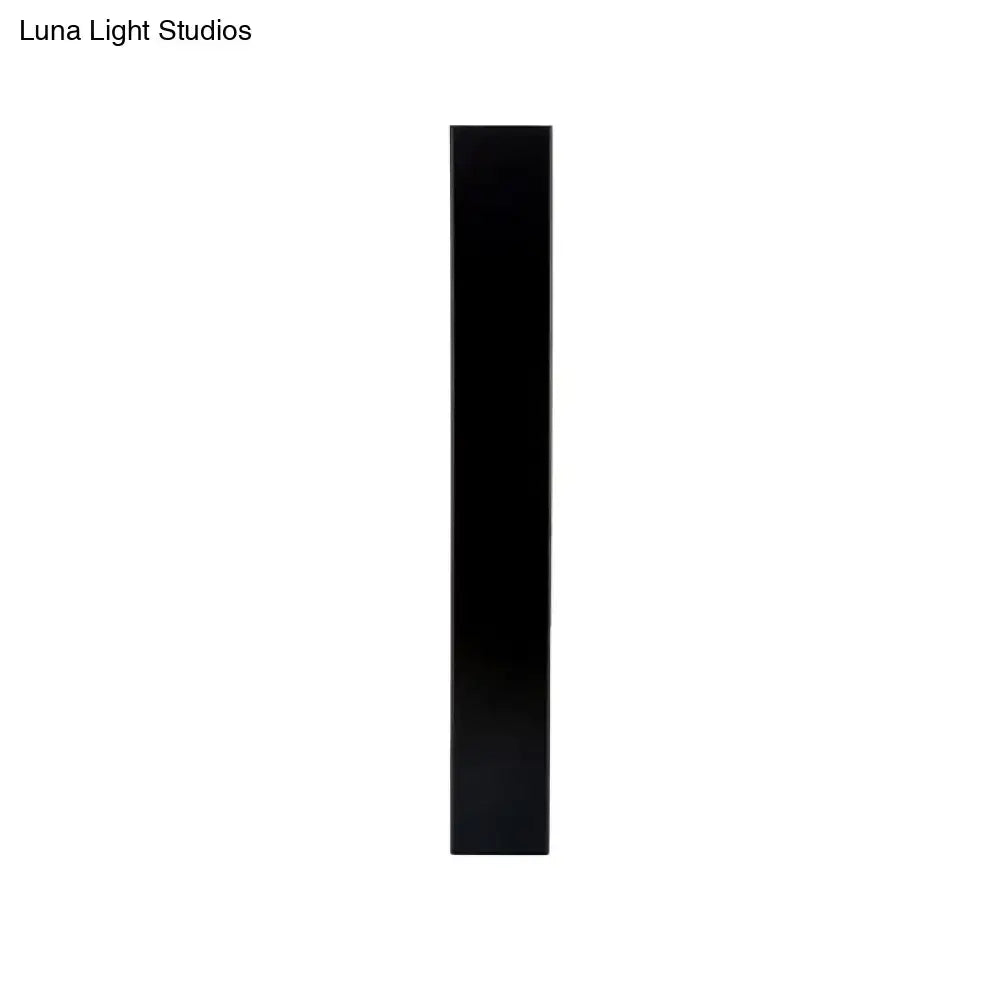 Minimalist black & white aluminum shade direct wired sconce bedroom