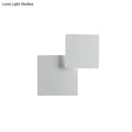 Minimalist white square wall lamp with smd light source featuring a sleek modern design for bedroom use