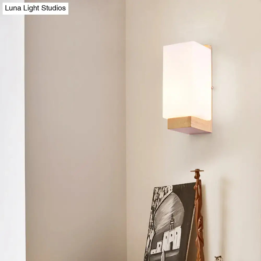 Minimalist brass and glass geometric wall sconce bedroom light