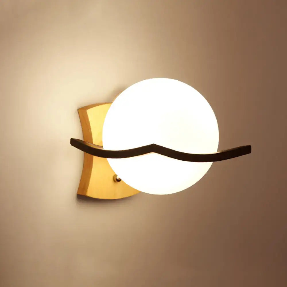 Minimalist brass and glass geometric wall sconce bedroom light