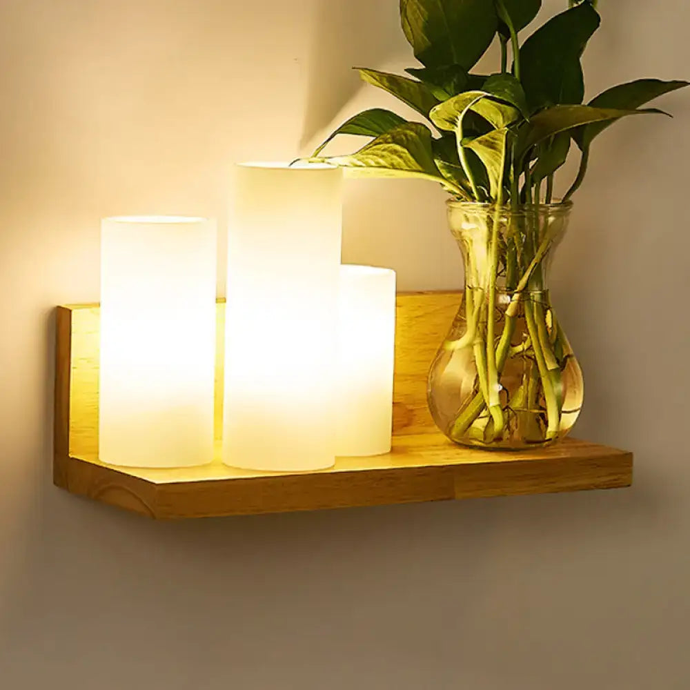 Minimalist brass and glass geometric wall sconce bedroom light