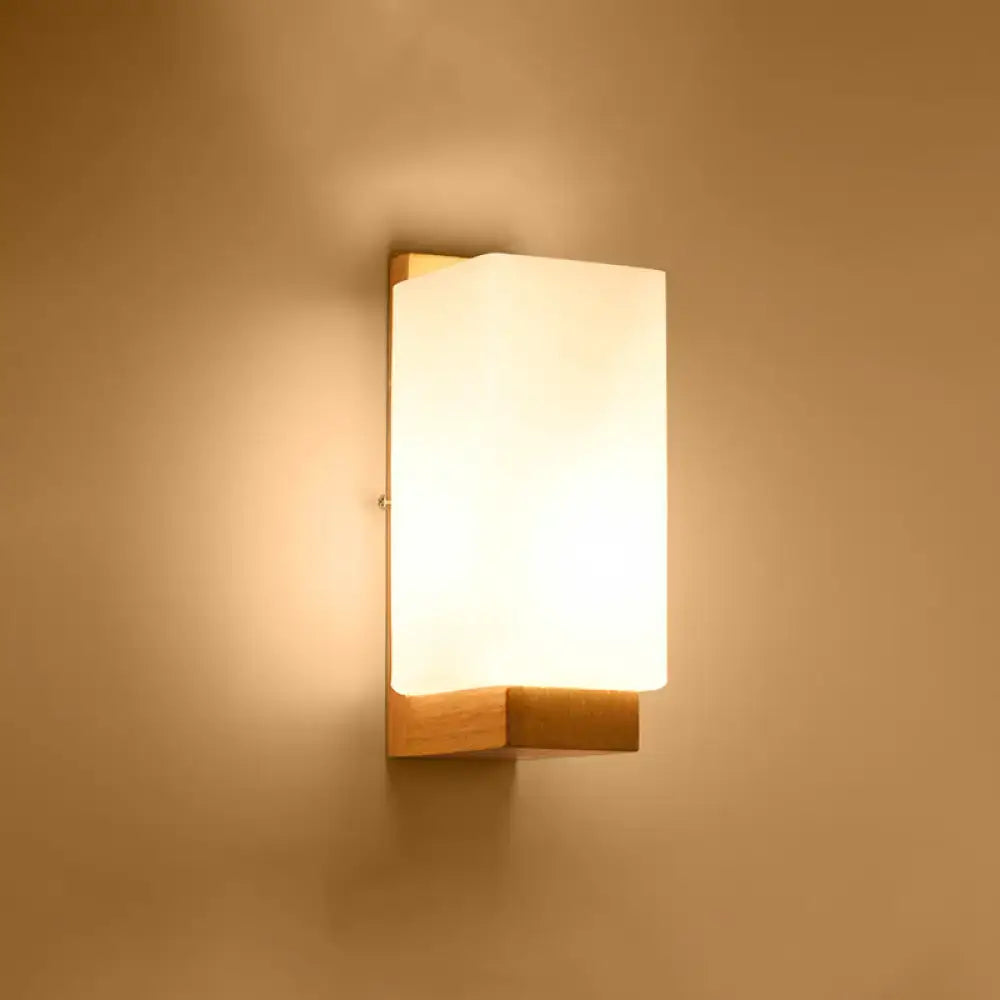 Minimalist brass and glass geometric wall sconce bedroom light