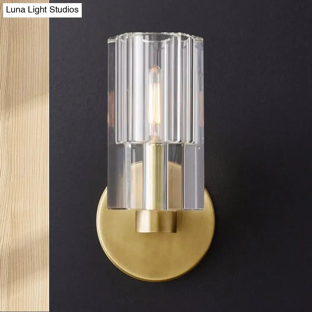 Minimalist brass ribbed glass wall sconce for living room