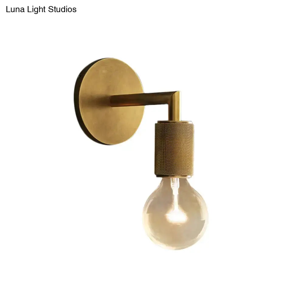 Minimalist bronze wall sconce with glass shade bedroom light