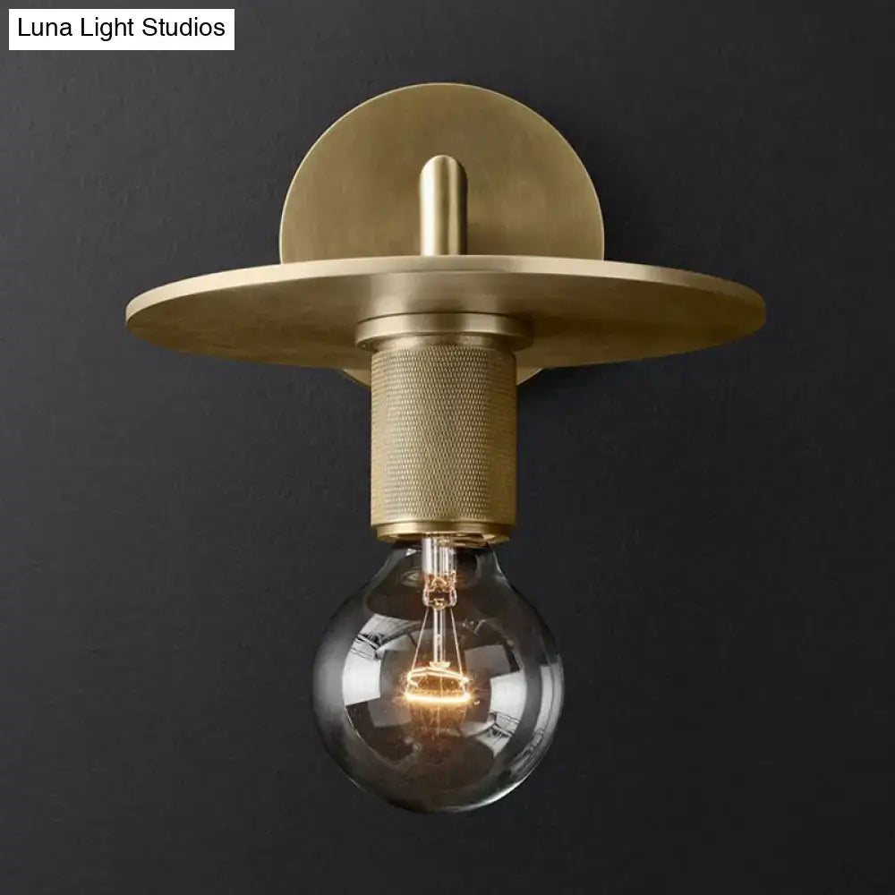 Minimalist bronze wall sconce with glass shade bedroom light