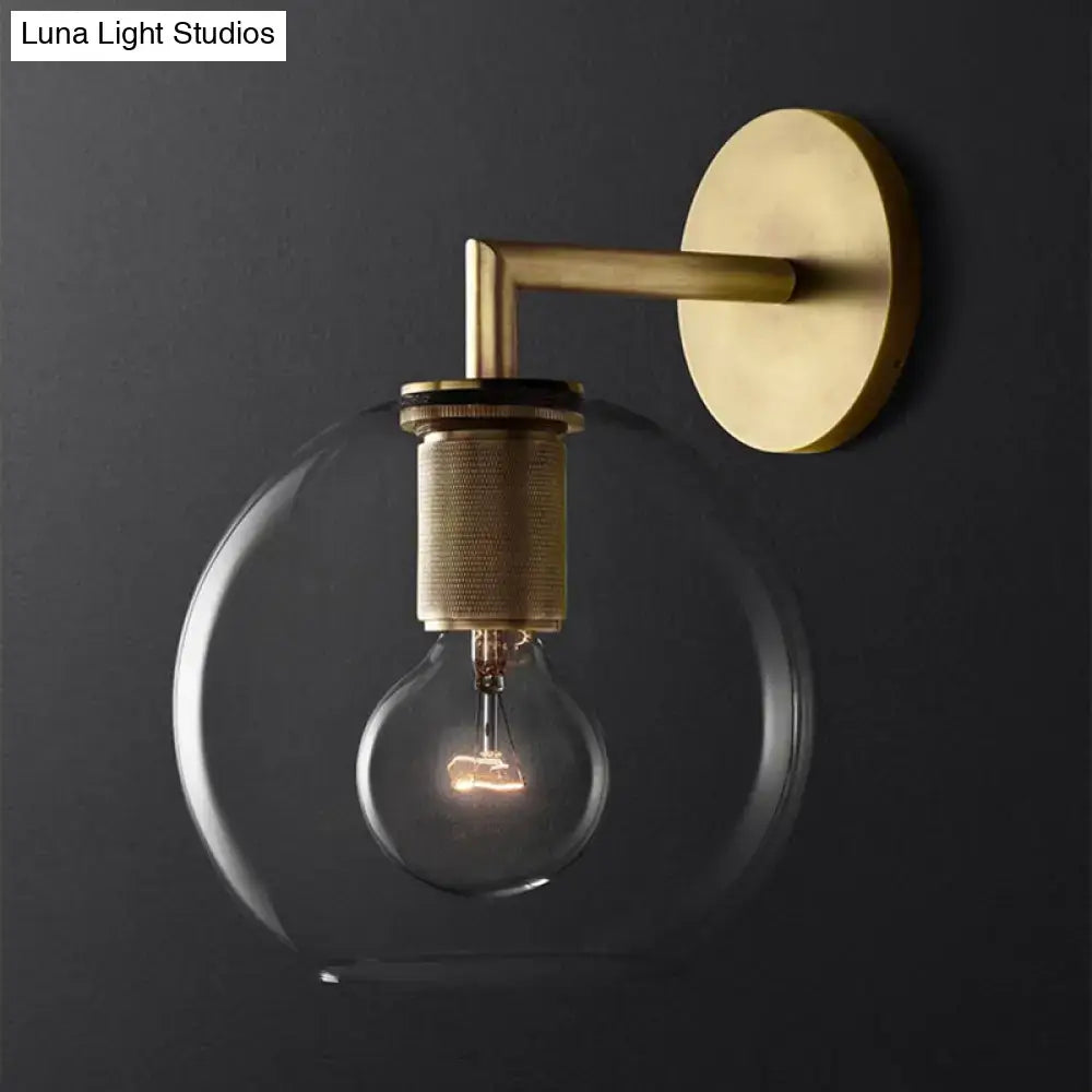 Minimalist bronze wall sconce with glass shade bedroom light