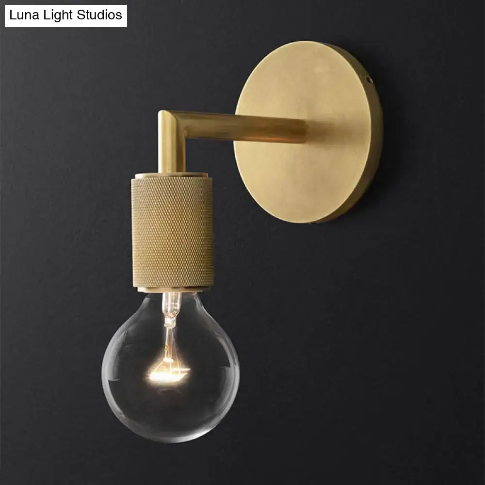 Minimalist bronze wall sconce with glass shade bedroom light