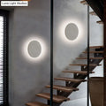 Minimalist cement grey flat round wall sconce light for bedroom