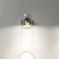 Minimalist gold and clear acrylic wall mount lighting with a sleek transparent acrylic sconce and polished metallic base