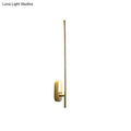 Minimalist gold wall lamp offers a sleek vertical rod design with a rectangular base for living room use