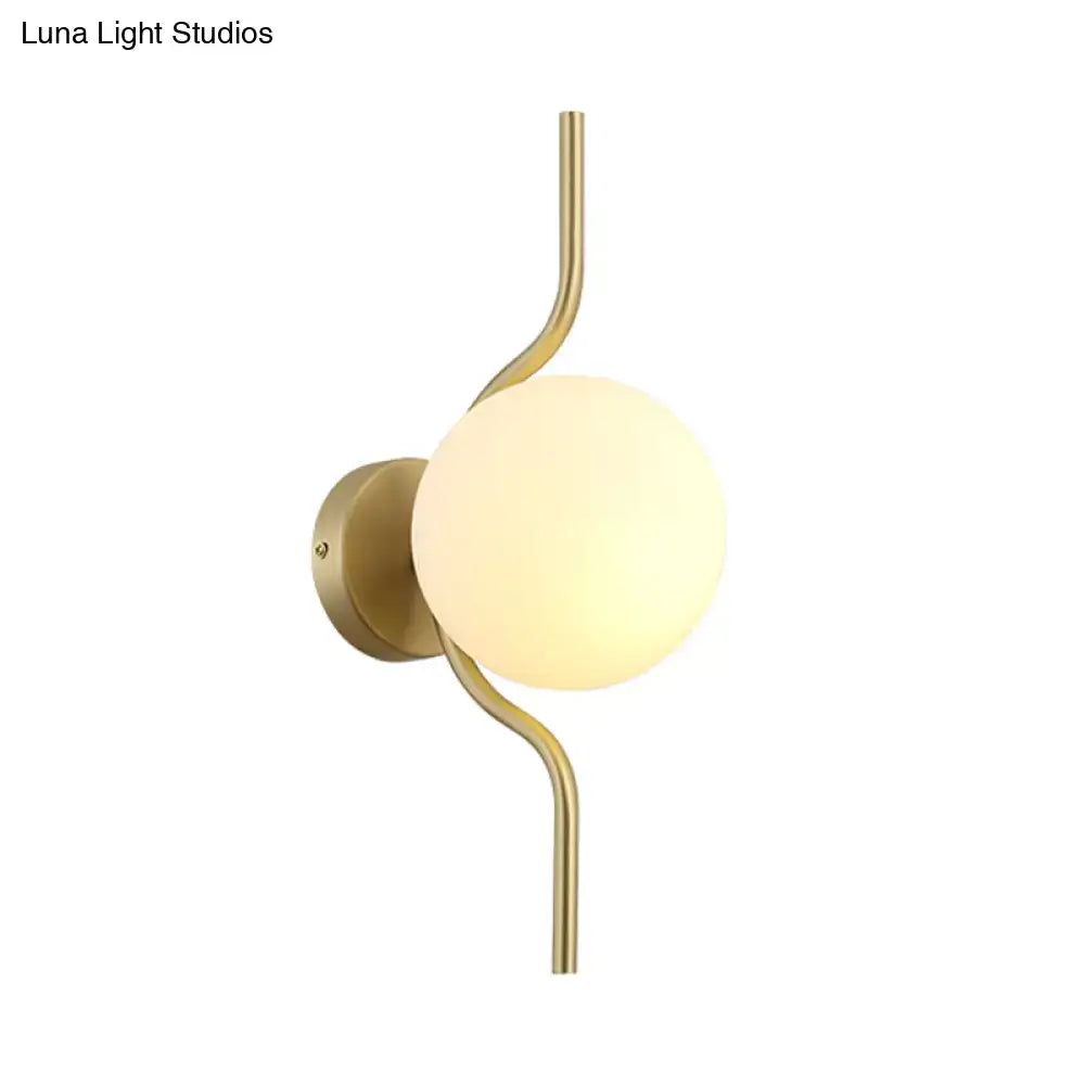 Minimalist gold wall light with white globe shade – bedroom sconce light