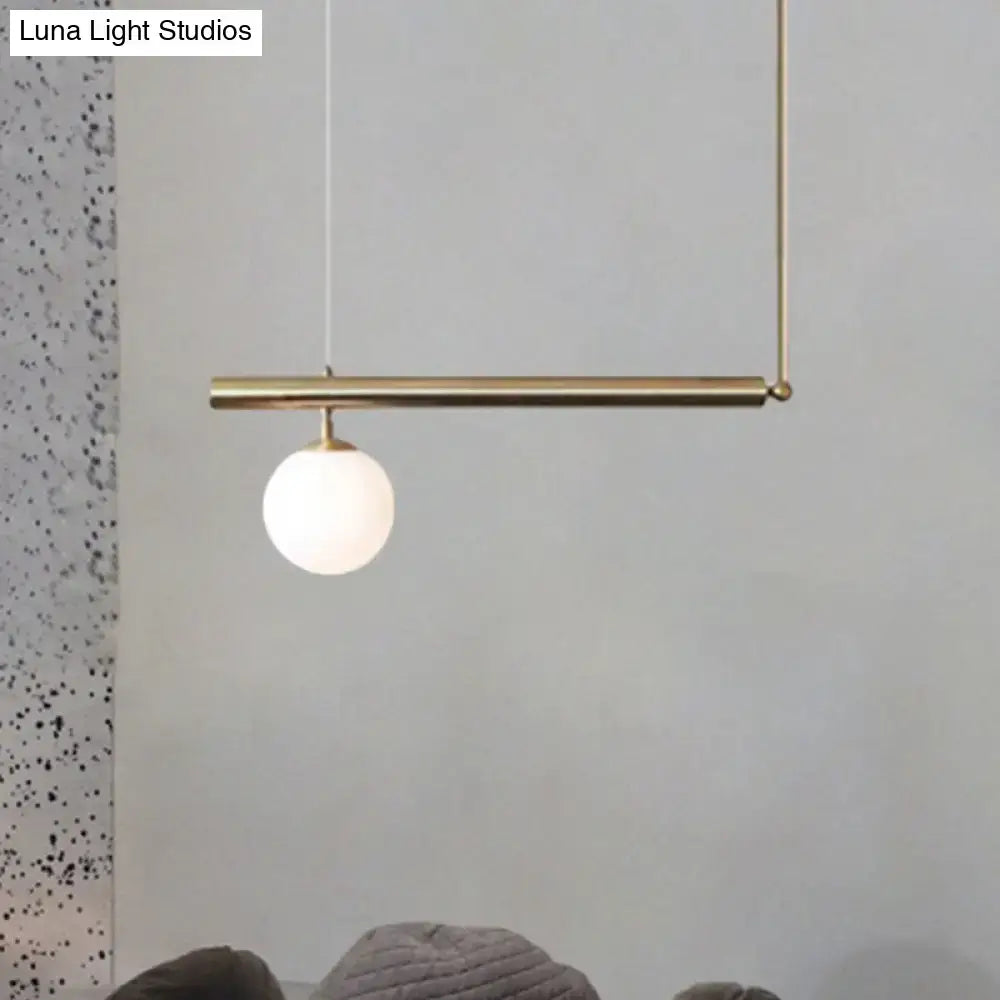 Minimalist golden glass sphere pendant light dining room