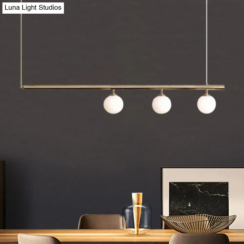 Minimalist golden glass sphere pendant light dining room