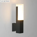 Minimalist led black wall lamp with rectangular frosted glass diffuser emitting warm white light for courtyard use