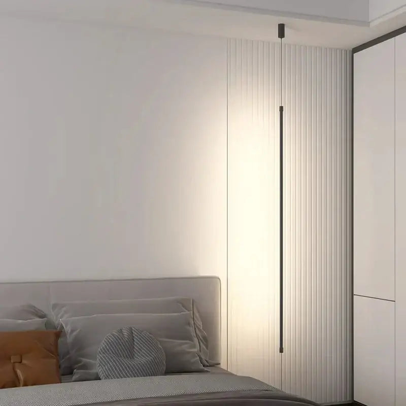 Minimalist matte black cylindrical pendant light strip bedroom