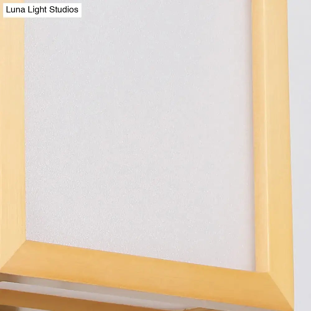 Minimalist white glass wall sconce with wooden frame for corridors