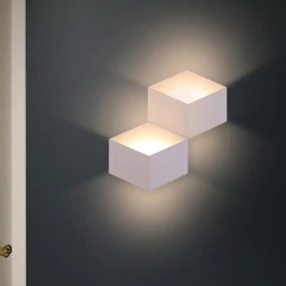 Minimalist white metallic geometric wall lamp with warm ambient lighting for corridor wall mount illumination
