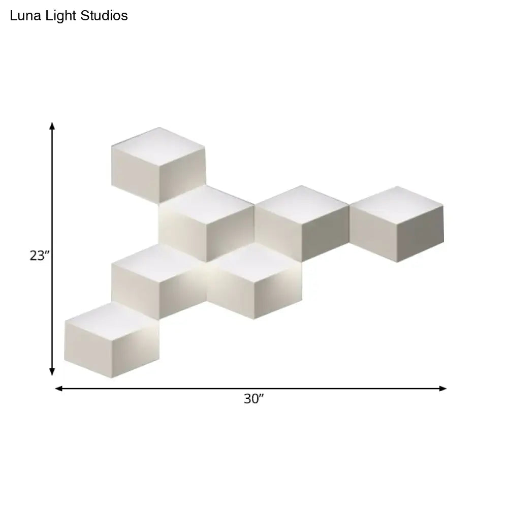 Minimalist white metallic geometric wall lamp with interconnected cubes designed as a geometric wall mount light for corridors