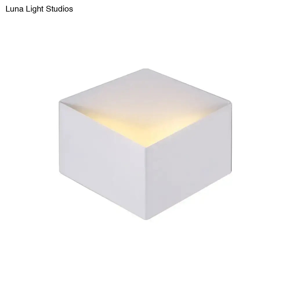 Minimalist white metallic geometric wall mount wall lamp with cube-shaped led night light and warm interior glow for corridor