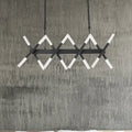 DecorBites™ modern acrylic tube island pendant light in black and white with intersecting angular bars for dining room lighting
