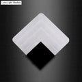 White square-shaped corner protector with black inner section for modern aged silver and black square led wall sconce