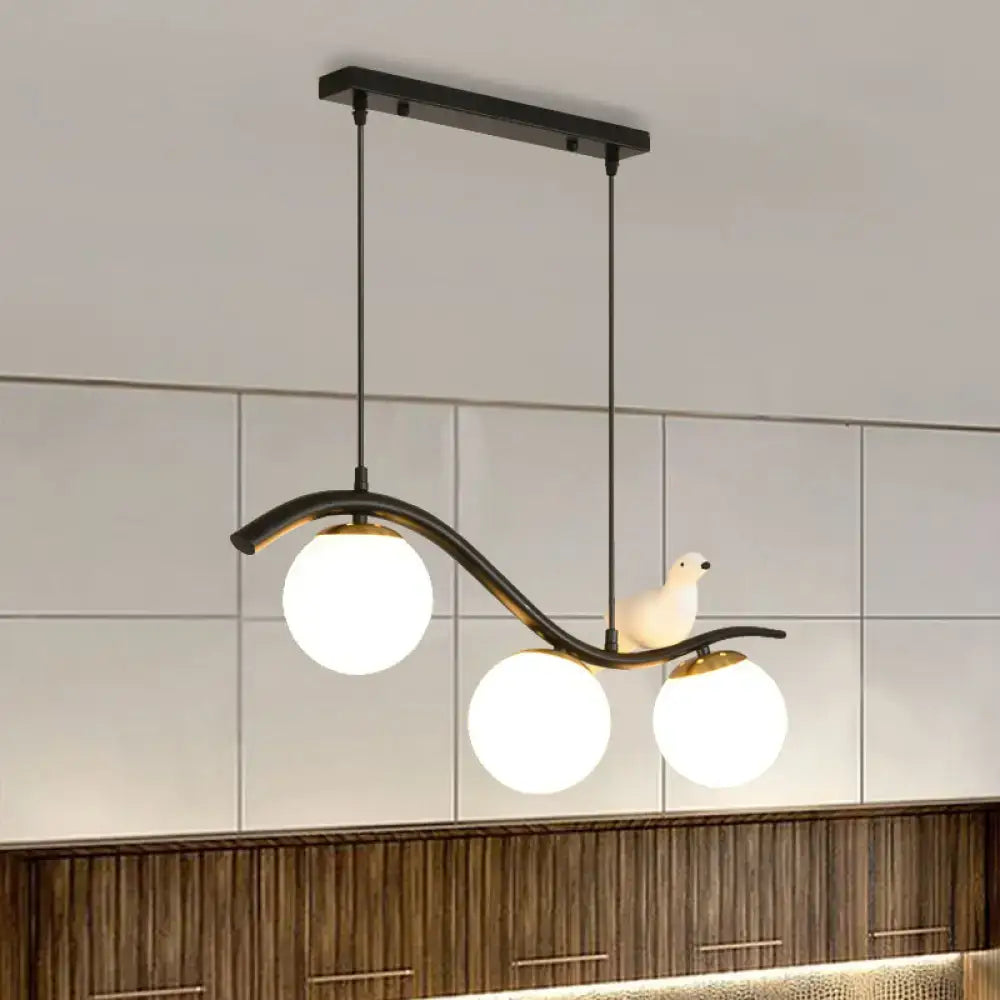 Modern black 3 light dining room pendant with clear white glass ball shade