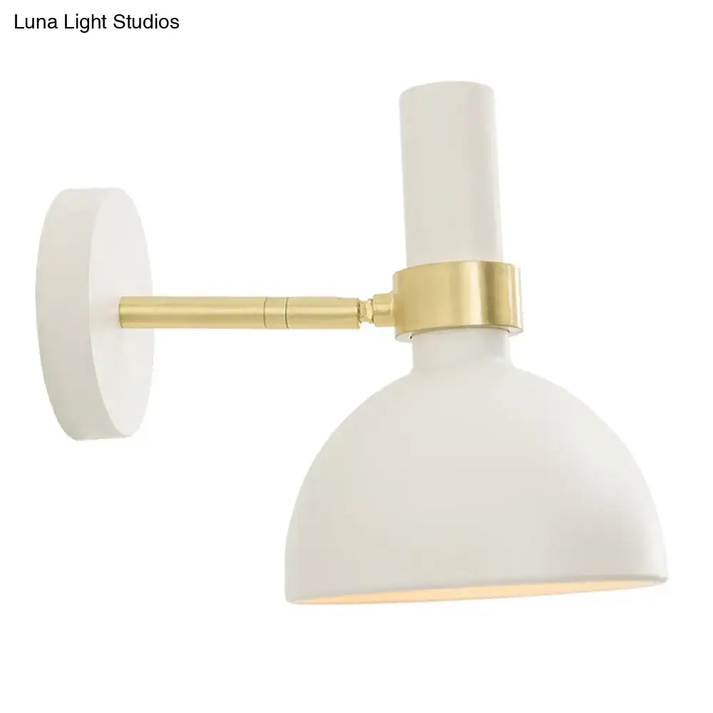 Modern black and brass domed wall lamp for bedroom bedside