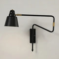 Modern black and brass retractable arm reading lamp bedroom light