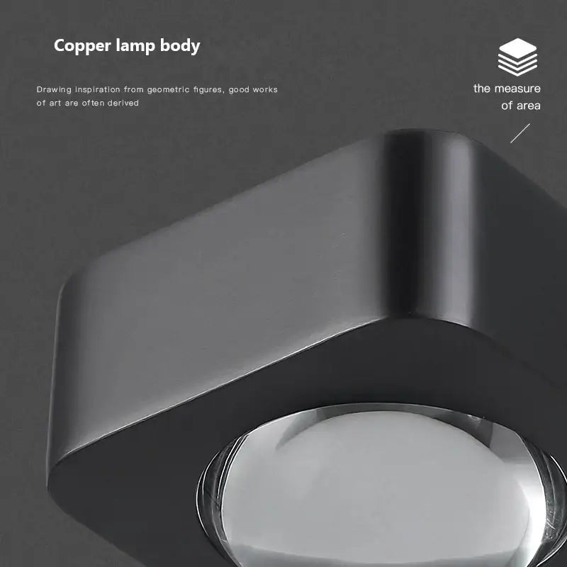 Modern black and copper bedroom wall lamp with glass dome