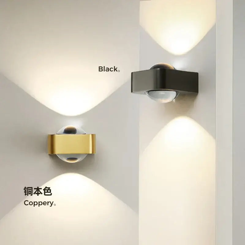 Modern black and copper bedroom wall lamp with glass dome
