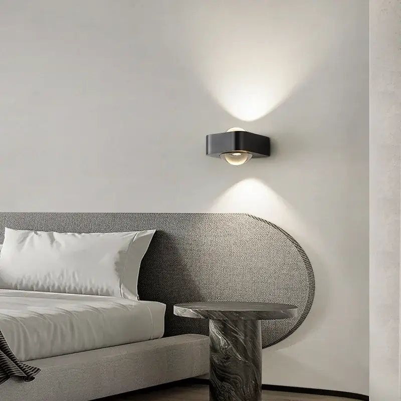 Modern black and copper bedroom wall lamp with glass dome