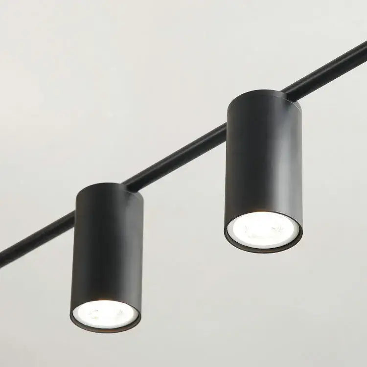 Modern black & brass minimalist dining room linear pendant light