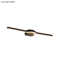 Modern black and brass slim line led vanity light with two elongated arms emitting white warm light for bathroom use