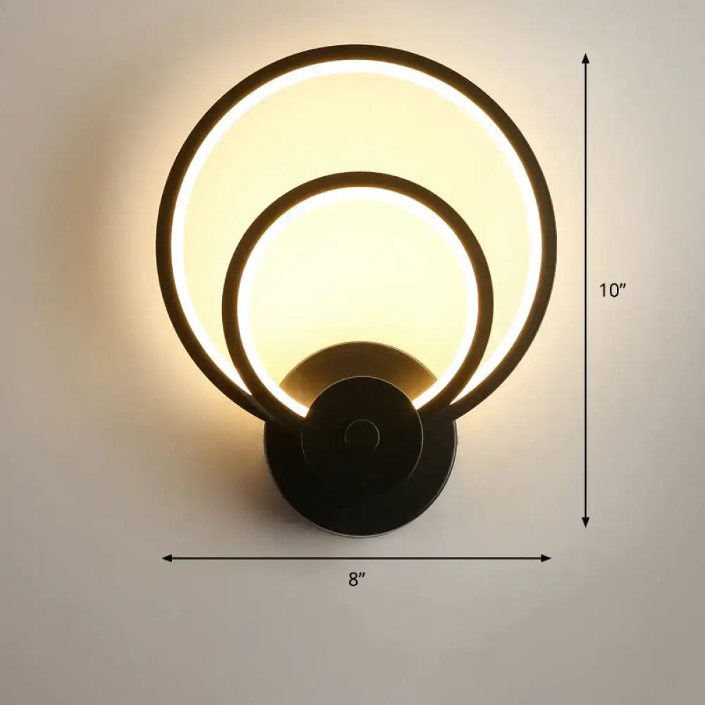 Modern black circular led light fixture with two illuminated concentric rings and remote control for bedroom wall sconce