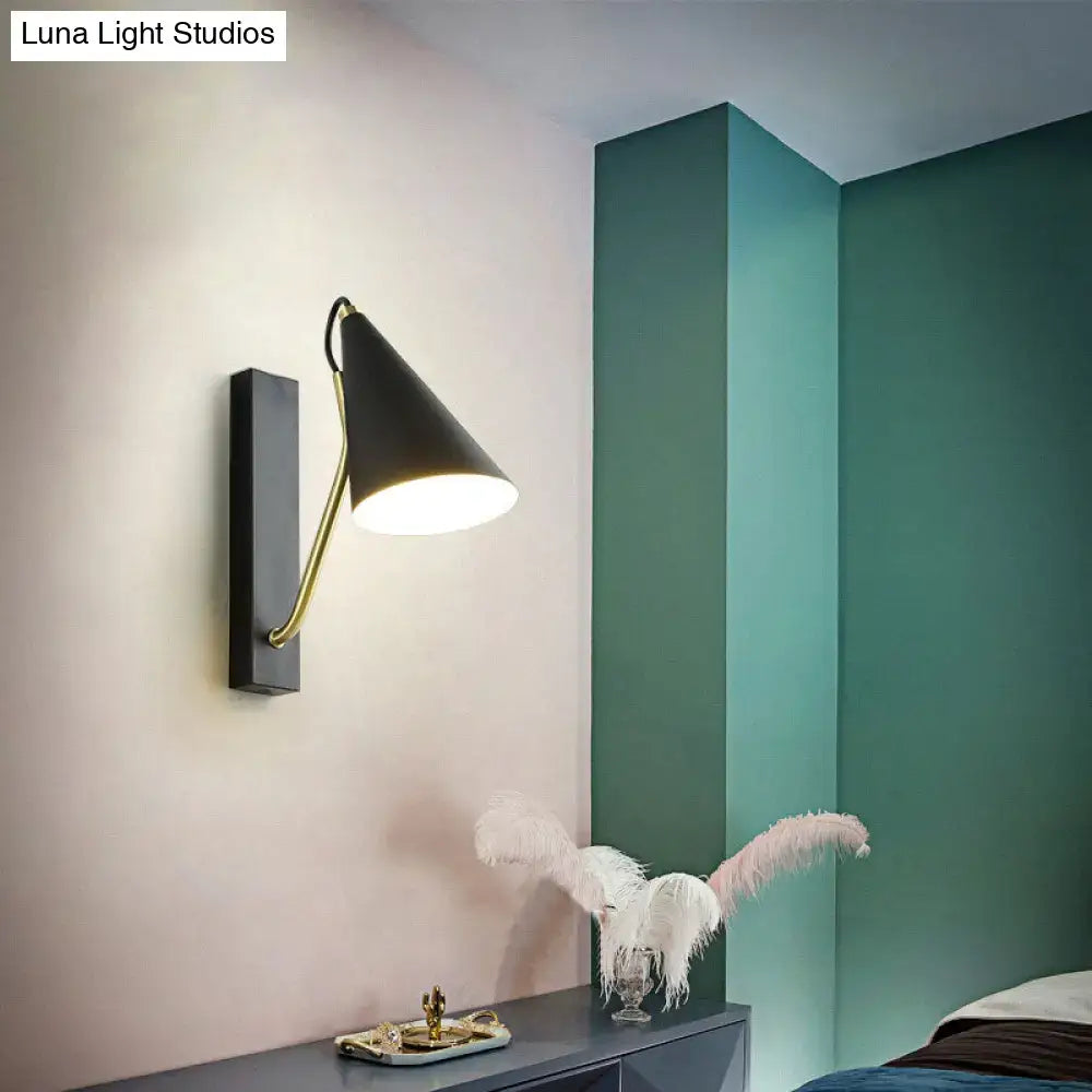 Modern black cone shade wall sconce with brass arm – bedroom light