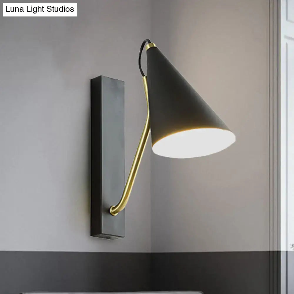 Modern black cone shade wall sconce with brass arm – bedroom light