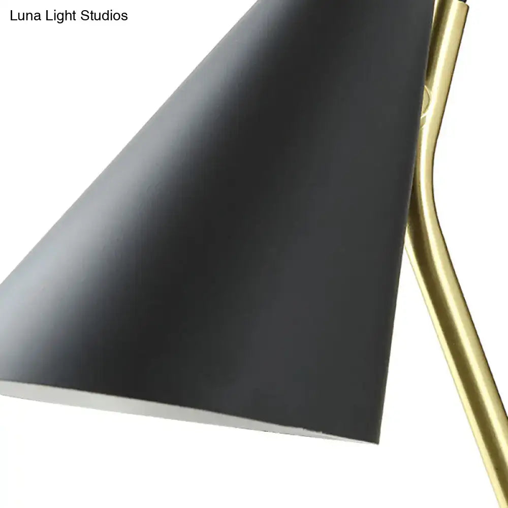 Modern black cone shade wall sconce with brass arm – bedroom light