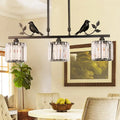 DecorBites modern black gold chandelier lamp with bird accents and three clear crystal drum shade pendant lights