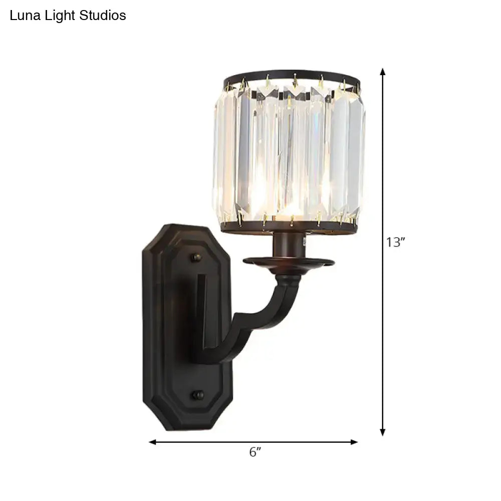 Modern black gold clear crystal wall sconce with 13 inch fixture height featuring vertical prisms in glass shade